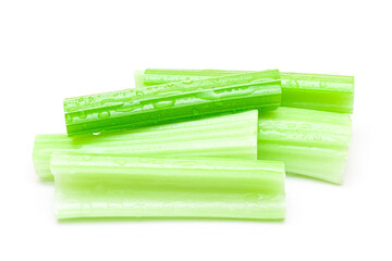 Fresh Chopped Celery Sticks with Water Drops Isolated on White Background. Vegan and Vegetarian Culture. Raw Food. Healthy Diet with Negative Calorie Content