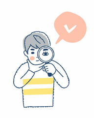 虫眼鏡を覗いている若い男性