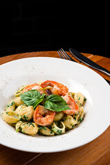 Delicious Italian pasta with shrimp and spinach