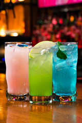 Popular alcoholic cocktails composition. Many cocktail drinks Blue hawaiian, tropical Martini, margarita