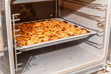 Baking plum cake in a kitchen