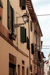 Fototapeta na wymiar Italian windows with shutters