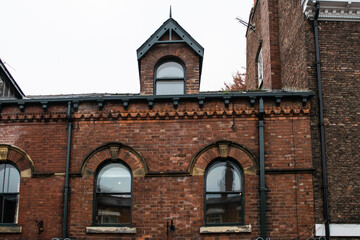 Facade of British old brick townhouse in York England