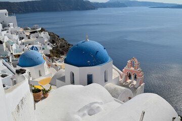 Tree bells church in Oia