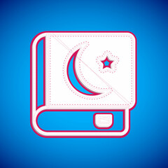 White Holy book of Koran icon isolated on blue background. Muslim holiday, Eid Mubarak, Eid al-fitr, Ramadan Kareem. Vector