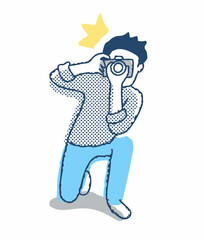 膝をついて写真撮影をしている男性