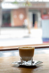 Specialty coffee menu; Dirty coffee is ristretto pouring from coffee machine into cold milk.