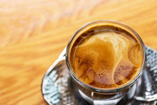 Specialty coffee menu; Dirty coffee is ristretto pouring from coffee machine into cold milk.