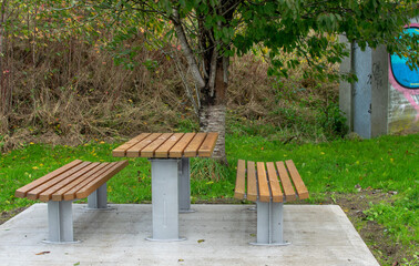 Benches and a table in the park