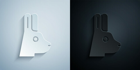 Paper cut Rabbit with ears icon isolated on grey and black background. Magic trick. Mystery entertainment concept. Paper art style. Vector