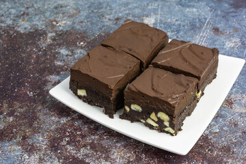 gluten free chocolate brownies with chocolate ganache and white chocolate chips