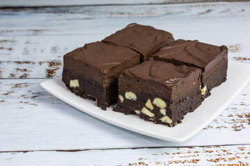 gluten free chocolate brownies with chocolate ganache and white chocolate chips - 470458587