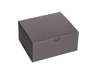 Black closed cardboard box isolated on a white background