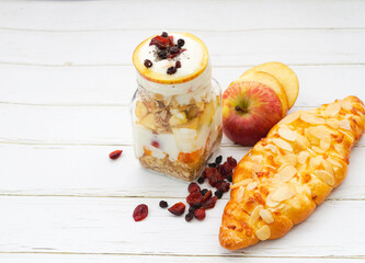 Yoghurt mixed fruit put on background,