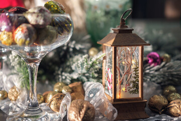Holiday Christmas decoration still life with colorful walnuts, selective focus