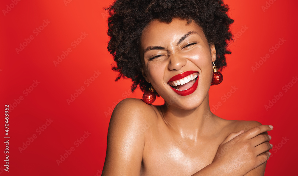 Wall mural portrait of beautiful black woman with afro curly hairstyle, red lipstick and glowing healthy skin,  - Wall murals