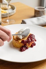 French toast with vanilla ice cream and raspberry jam