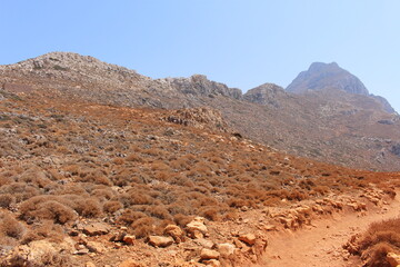 Rough Balos Lagoon (or Balos Beach) trail and territory in northwestern part of Crete Island, Greece. After 10 kms of bumpy car road, about 7 kms of footpath leads to the famous beach.
