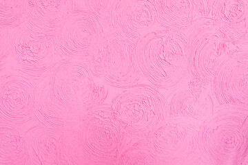 Beautiful pink background with abstract stucco flowers. Copy space
