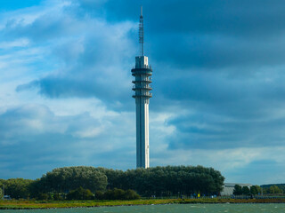 Obraz premium Communication Tower of a radio mast, tall structure designed to support antennas for telecommunication and broadcasting, television. Now used as a computer data center. Lelystady, Netherlands.