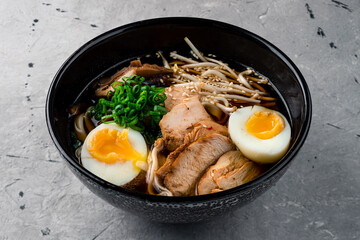 Japanese ramen soup with chicken, egg and sprout