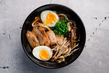 Japanese ramen soup with chicken, egg and sprout