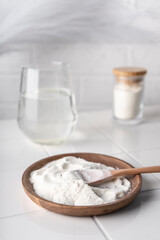 selective focus. food supplement collagen in the form of powder for dissolving in water. natural composition. benefits for the face and body