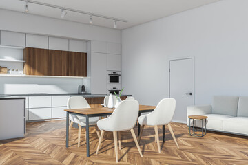 Fototapeta na wymiar White kitchen set interior with dining table and four seats, sofa near door