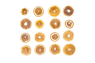Dried oranges on white isolated background. Flatlay. 