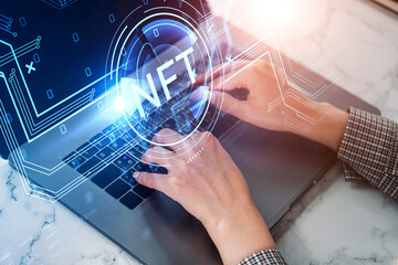 Businesswoman fingers typing on laptop keyboard, nft hud