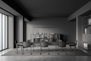 Grey business room interior with chairs, table and shelf on concrete floor