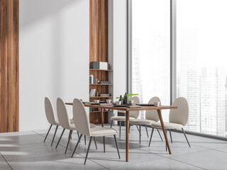 White and beige office dining room. Corner view.