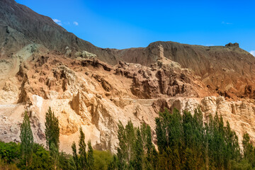 Ruins at Basgo with stones and rocks, Ladakh, Jammu and Kashmir, India - blue sky background, daytime image.