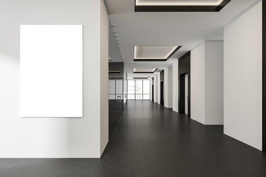 Bright office hall interior with empty white poster, panoramic window