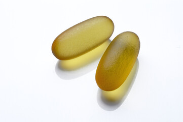 Omega 3 Fish Oil Supplement Capsules on a White Background.