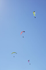 paragliding in the blue sky