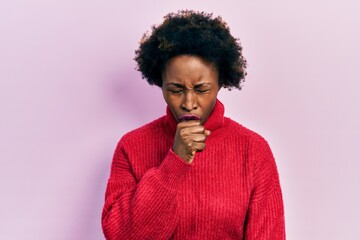 Obraz na płótnie Canvas Young african american woman wearing casual clothes feeling unwell and coughing as symptom for cold or bronchitis. health care concept.