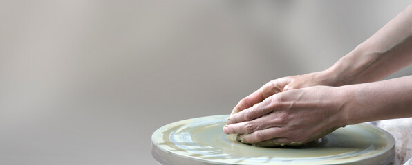  hands making ceramic cup