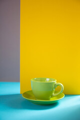 Coffee cup on abstract paper background texture as minimalism style.