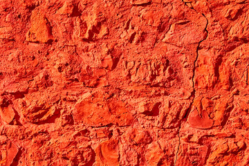 texture of bright red wall, covered plaster, style grunge, space for text, space for copy