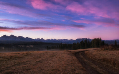 The colors of the sky at sunrise against the backdrop of the Tatra Mountains