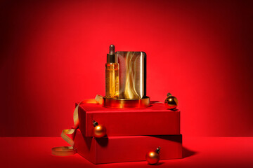 Gold cosmetics on podium, gift boxes decor on red background