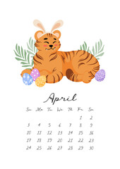 Calendar 2022. Month of April. A cute tiger, symbol of the Chinese New Year, celebrates Easter. Painted eggs, grass, Rabbit ears. For calendar, planner, note.