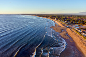 Aerial photograph of the coastline near Old Orchard Beach, Maine showing the sandy beach and urban...