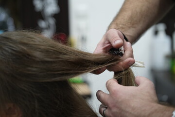 Shirring long hair in a hairdresser's shop is a frequently ordered procedure. As it helps the hair look more voluminous