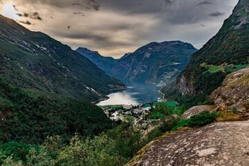 Naklejka premium Scenic view on beautiful Geiranger fjord, town and Norwegian mountains