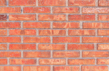 Brick wall texture with cracked tiles and cement. Classic brickwall surface background