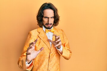 Young hispanic man wearing hipster elegant look disgusted expression, displeased and fearful doing...
