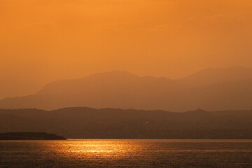 Beautiful Orange Sunset at Lake Garda in Italy