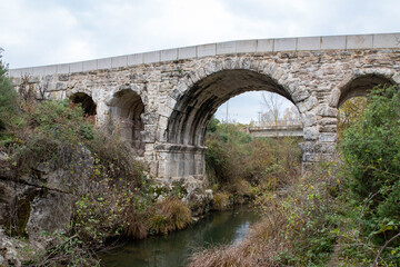 Fototapeta na wymiar The historical Taşköprü, which was built by the Romans on the Göksu River with the villages of Kutluca and Duranlı, Korfez, Derince, Gebze, Kocaeli